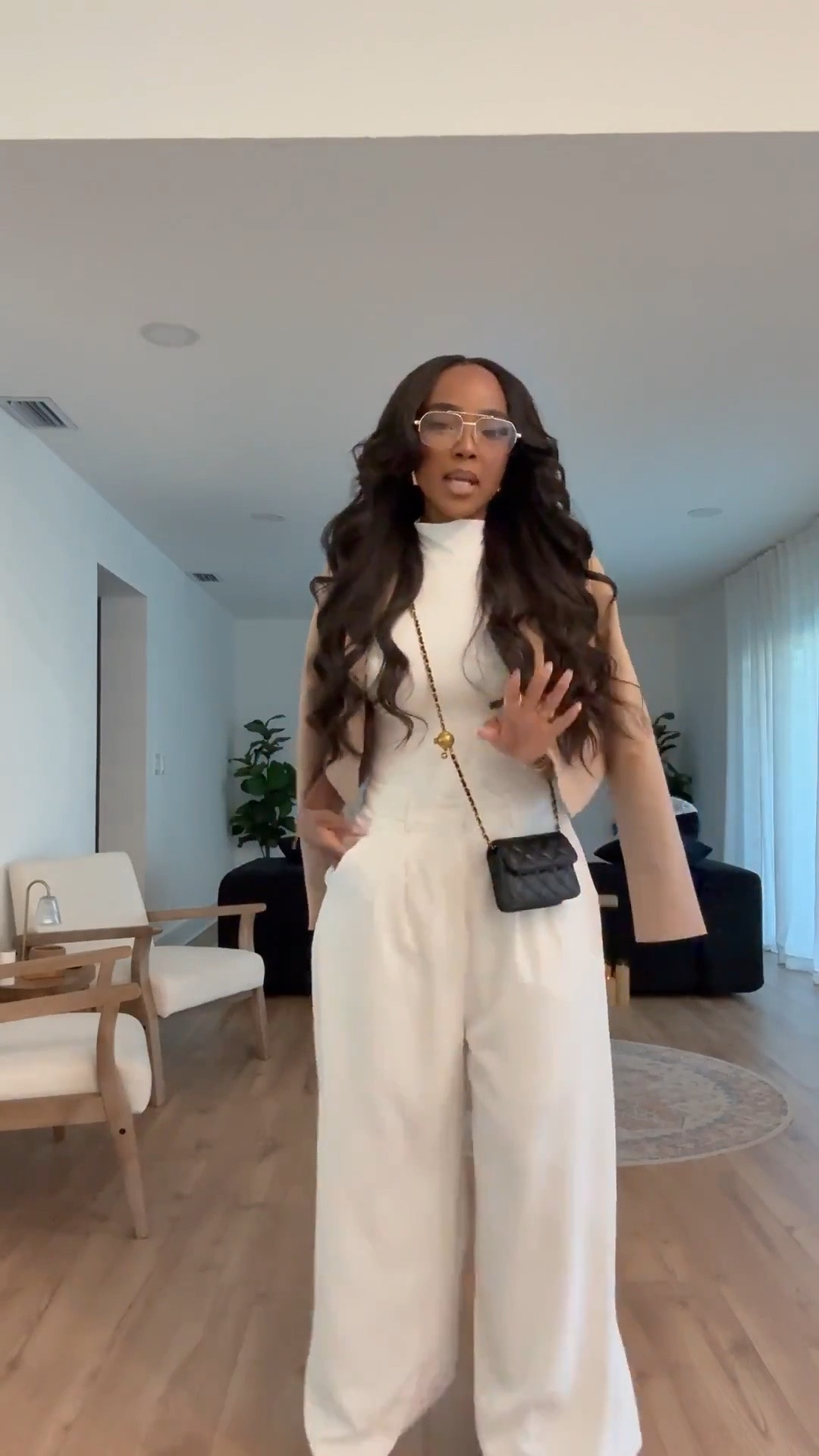 Hi Babes!

This is one of those outfits that looks designer without the designer price tag. The monochromatic cream base paired with the camel blazer draped over the shoulders gives instant old-money energy. The wide-leg trousers elongate the legs while the fitted mock-neck keeps everything polished and sophisticated.

If you're looking for an outfit that feels expensive, effortless, and timeless, this is exactly it. I love how the black mini bag adds contrast and makes the entire look feel even more elevated.

Where to wear this:
• Work meetings
• Lunch dates
• Business casual events
• Networking events
• Travel days
• Coffee runs
• Brunch with the girls
• Fall transition outfits

Undergarments: Nude seamless bra and nude seamless underwear to keep the cream tones looking smooth and polished.

Everything is linked below.

xx Kira | IG: KirasFashionFinds

34D - 27 - 40 • Size Small or 4

Follow me on Instagram and YouTube @kirasfashionfinds

#LTKgrwm #LTKootd #LTKPetite