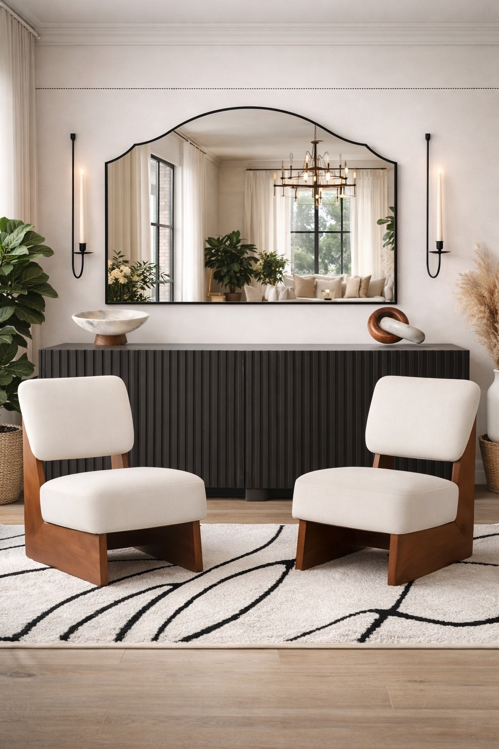 Modern organic with a hint of drama 🤍 The oversized arched mirror makes the space feel grand, while the black fluted console grounds it with contrast. Warm wood chairs + soft cream upholstery keep it cozy and elevated. ✨

#LTKSaleAlert #LTKSpringSale #LTKHome