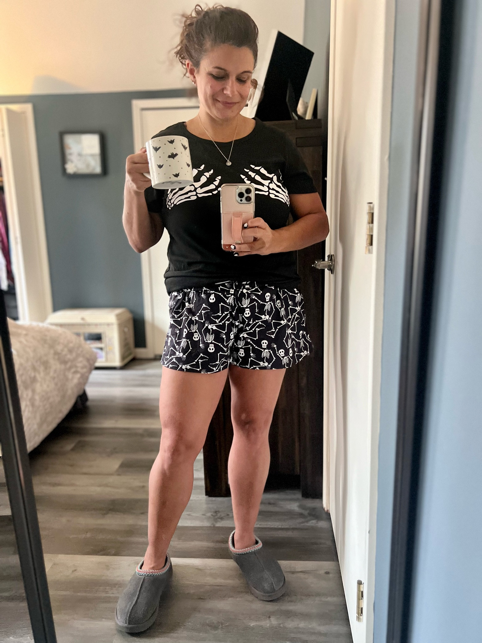 Feeling festive and cozy in my Halloween PJs! 🎃👻 These Ekouaer skeleton pajamas are perfect for spooky season—comfy, cute, and they even have pockets! 🖤☕️ Sipping from my stoneware mug and staying cozy in my Ugg Tasman slippers—ready for all the Halloween vibes!

#LTKSeasonal #LTKHalloween #LTKFindsUnder50