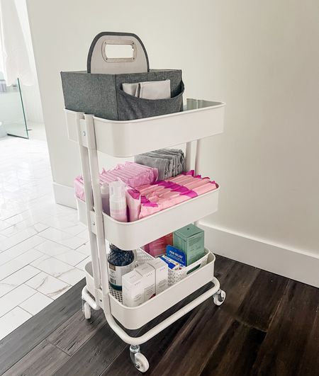 Postpartum cart! All the must haves in one place 👏🏼 easy to bring from bathroom to bedside. Diapers in top, down there care and supplements for new mom 🫶🏻

#LTKbaby #LTKbump #LTKfamily