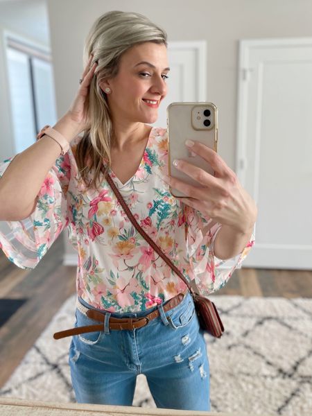 Flower state of mind 🌸
This beautiful flower print top is making me feel quite spring-y. Pink nails, pink watch … yeah you get it. Pink is the color choice. 

#LTKstyletip #LTKunder50 #LTKFind