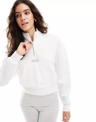 Levi's cropped half zip sweat with small logo in white | ASOS (Global)