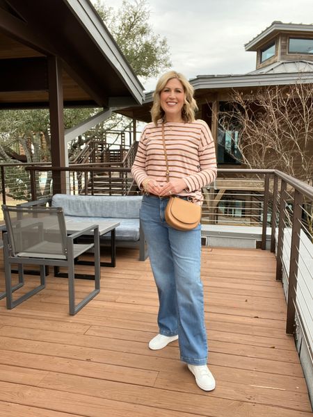 Striped knit top with button detail on the side. Fit is roomy. Runs tts. Denim light wash denim. Run tts. 

#LTKFind #LTKstyletip #LTKunder100