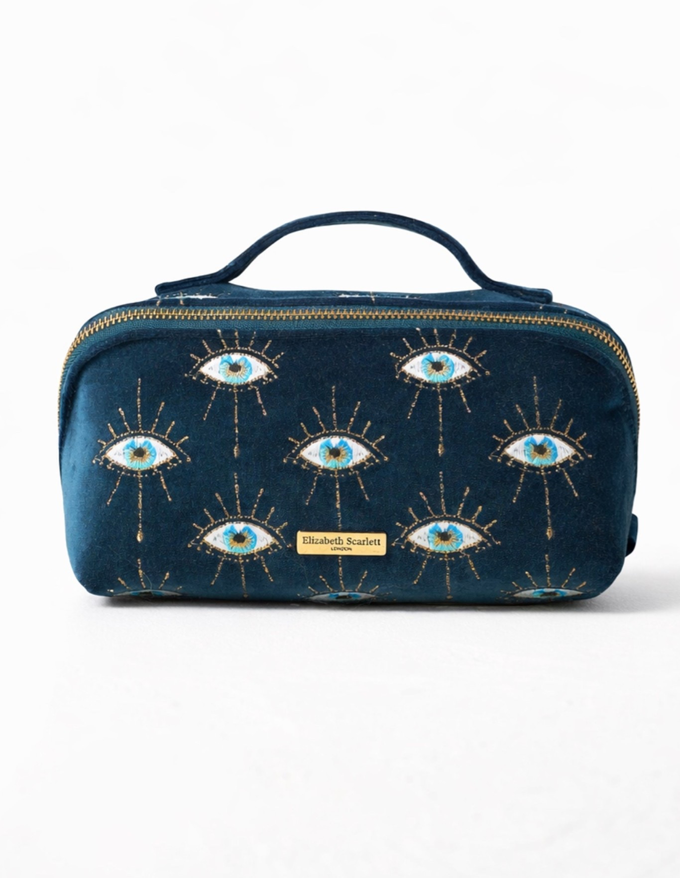 Mystical Eye Velvet Open Flat Makeup Bag
Elizabeth Scarlett

Inspired by ancient symbols of protection, this dreamy design features a beautifully-illustrated eye embroidered with threads of gold and silver. Say goodbye to rummaging with this clever makeup bag that lays flat on any surface to reveal your must-haves, beautifully organised

#LTKmomlife #LTKTravel #LTKBeauty