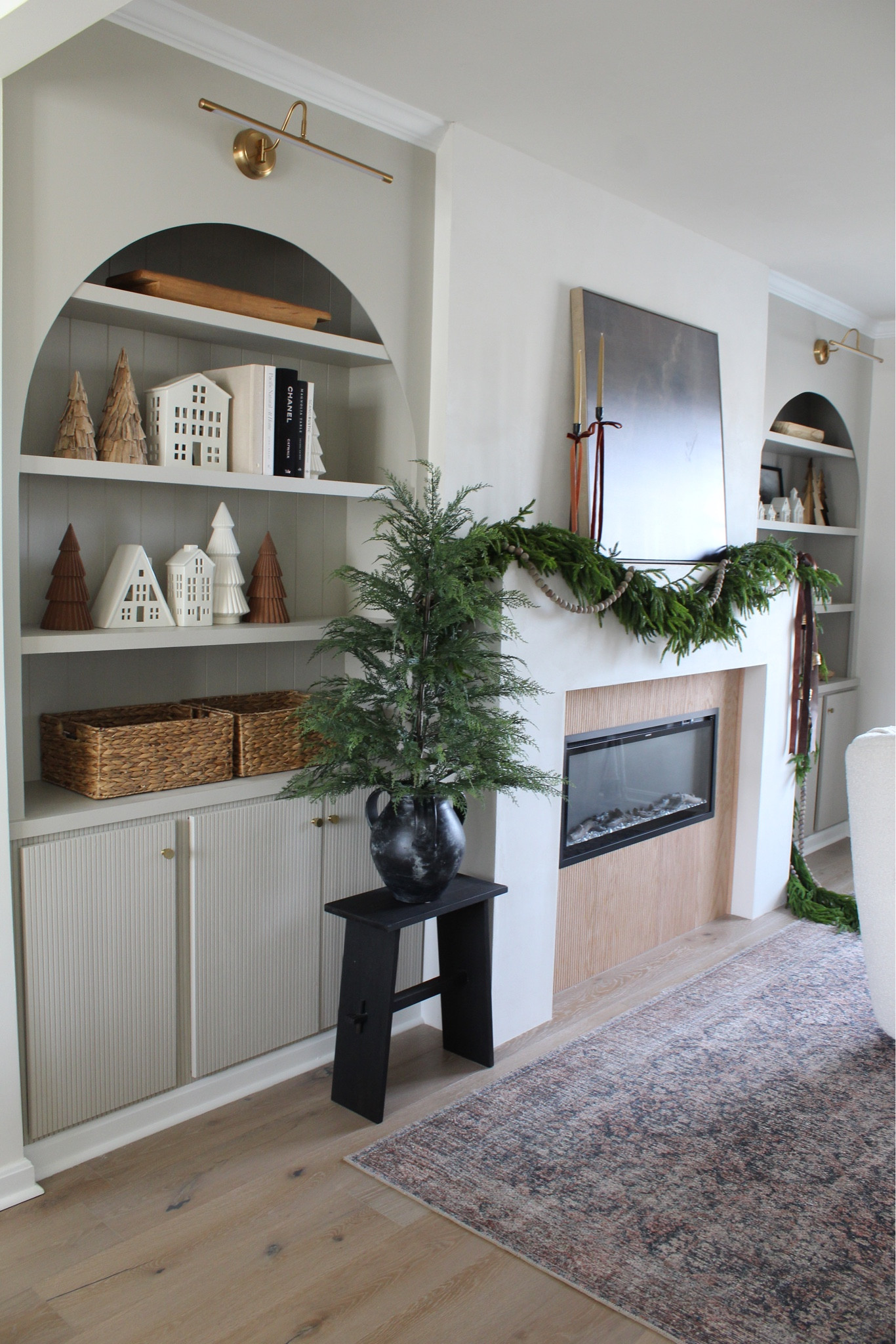 Fireplace, vase, Norfolk Garland, bells, ribbons, Christmas tree, rug 

#LTKHome #LTKHoliday #LTKSeasonal