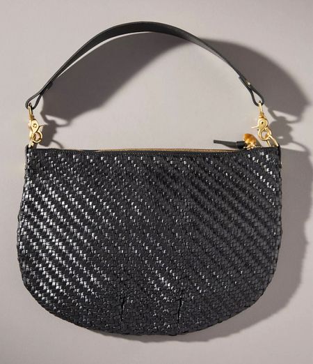 Gorgeous. I need it. Black woven sling bag  

#LTKitbag #LTKstyletip #LTKxAnthro