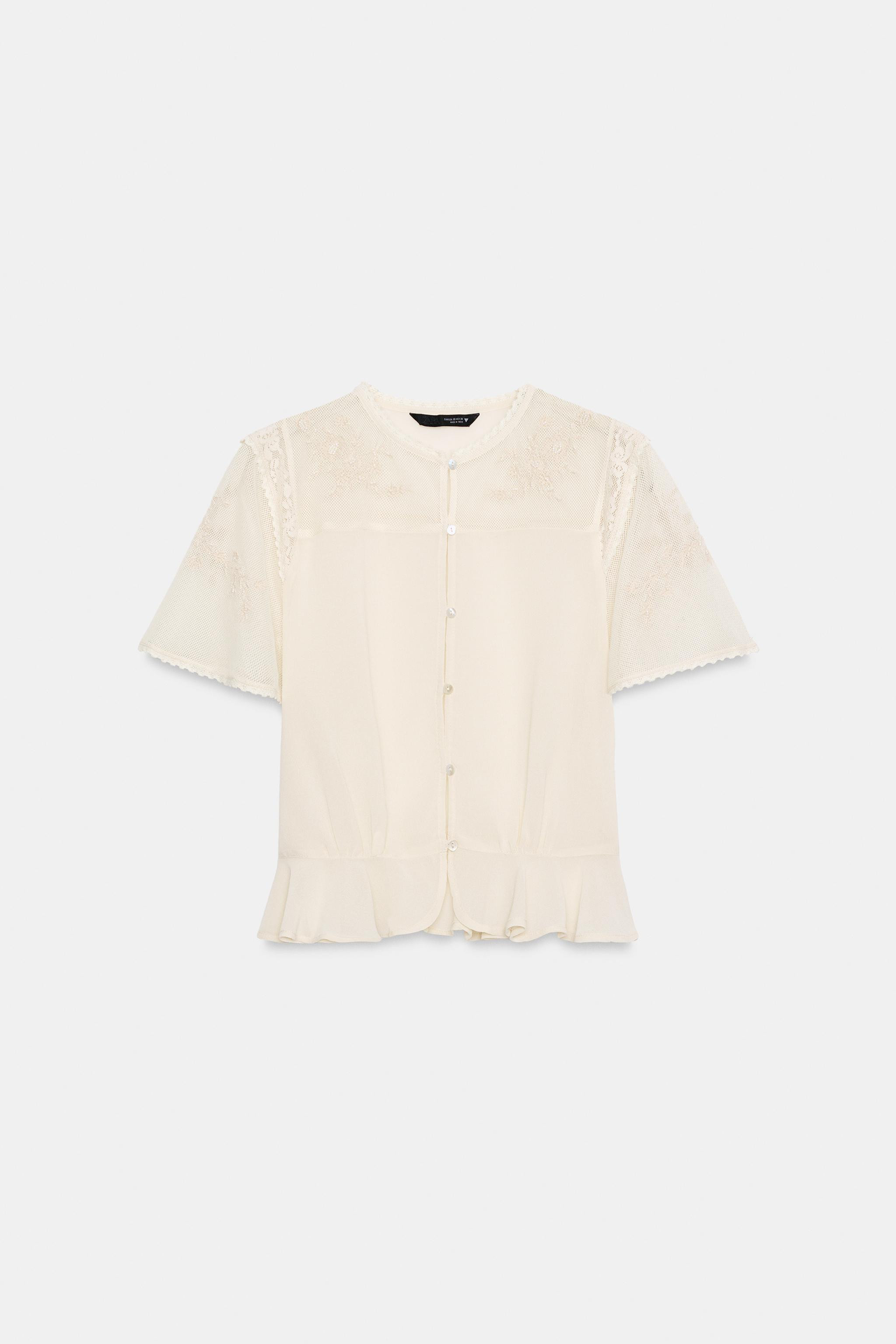 Round neck top with short cape sleeves. Tonal fabric detail with embroidery. Ruffle hem. Front bu... | Zara Canada