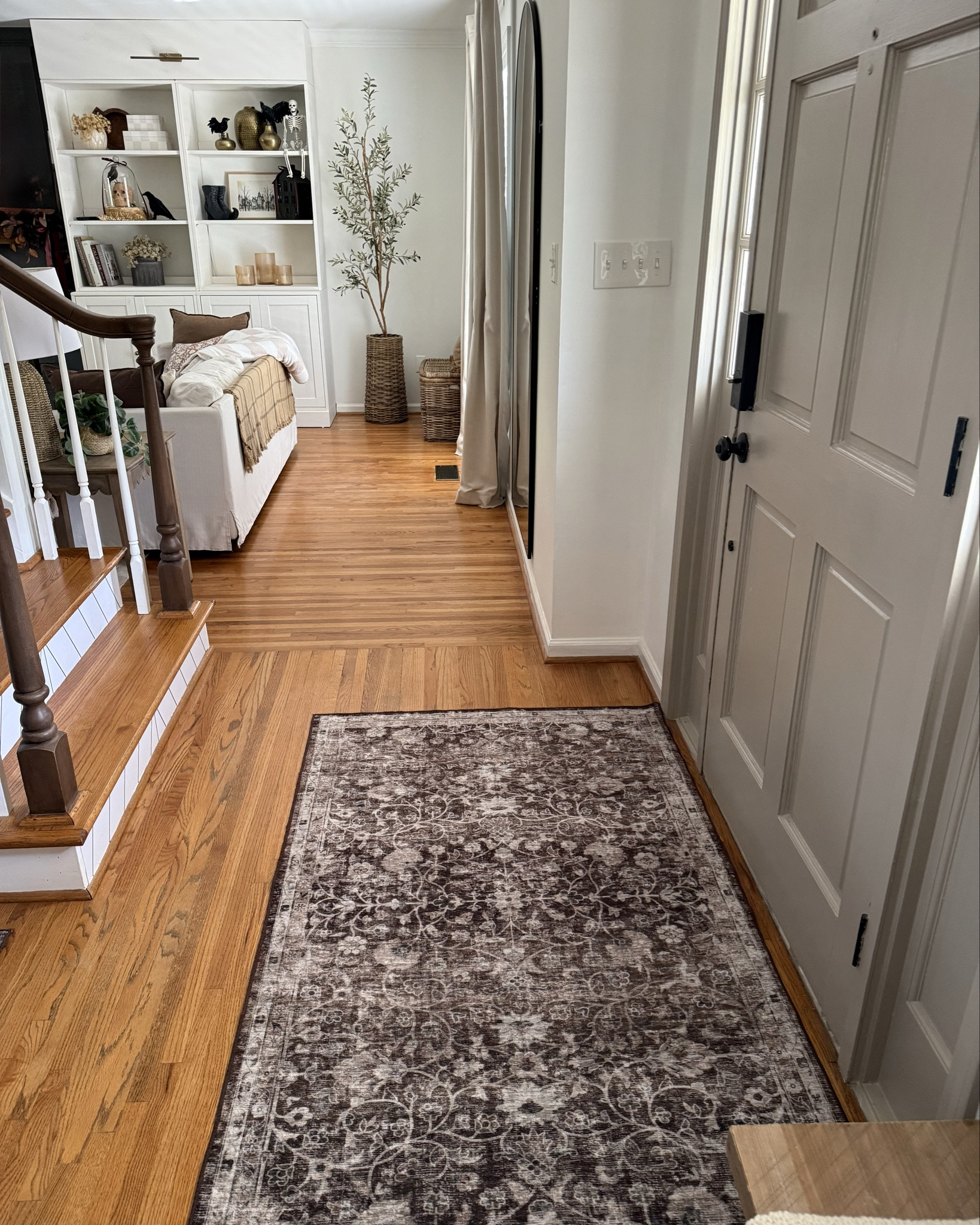 Entryway views 

Rug has a vintage look, non skid backing and is machine washable - perfect for high traffic areas or if you have kids/pets 

Front door interior : BM Pashmina 
Wall: BM Chantilly Lace 

#LTKSeasonal #LTKHome #LTKStyleTip