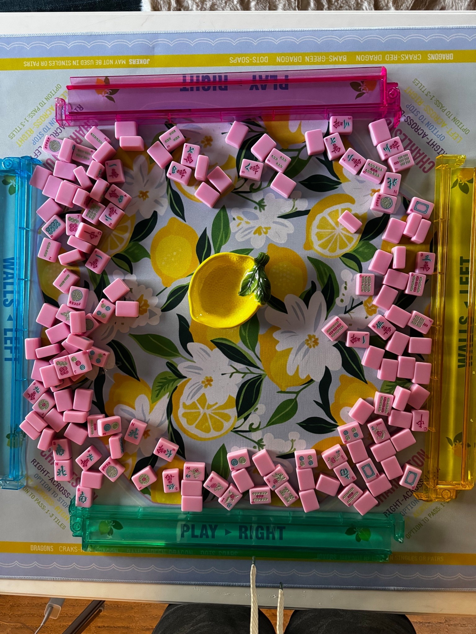 Posting for my mahjong clients! Everyone who has been taught Mahj 101 and 102 should have their own tile set!  Playing online helps with pacing but playing with tiles builds memory skills. I am linking beginner friendly options. Pictured: Hobby Mobby tiles with multi colored racks paired with Amazon mat. 
If you want the brand name tiles, you can use code PINKLOTUS for a discount on ohmymahjong.com and mahjongco.com. 
#mahjong 

#LTKSeasonal #LTKSpringSale #LTKSaleAlert