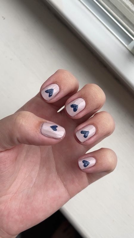 Little heart nail design 🤍🤍 I made 2 small dots with the dotting nail tool and then connected them and filled in the heart with the thin brush! 

#LTKbeauty #LTKFind