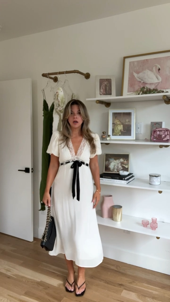 White midi dress with lace trim and black bow wearing my usual small

Bohme code: emerson20
Dibs code: Emerson [unbothered bronze]
Electric picks code: emerson20

White dress
Date night
Brunch dress
Event dress
Party dress


#LTKParties #LTKWedding #LTKFindsUnder100