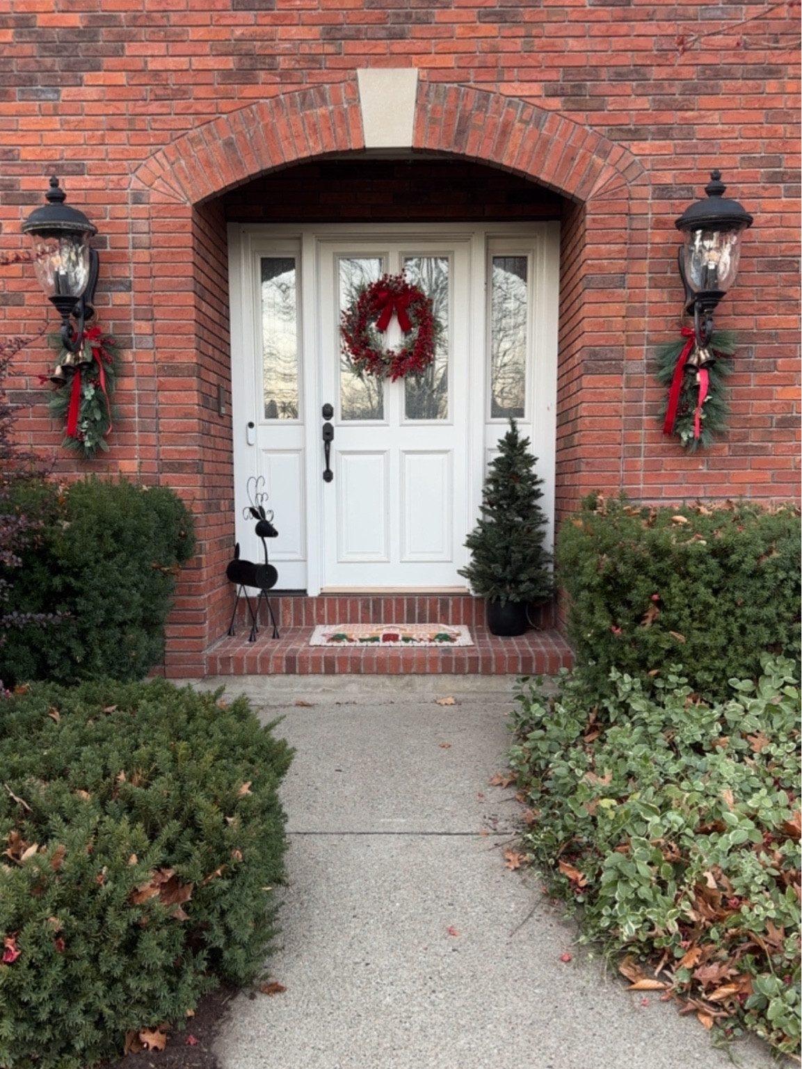 Outdoor porch decor
Christmas front porch
Christmas wreath and swags

#LTKSeasonal #LTKHoliday #LTKHome