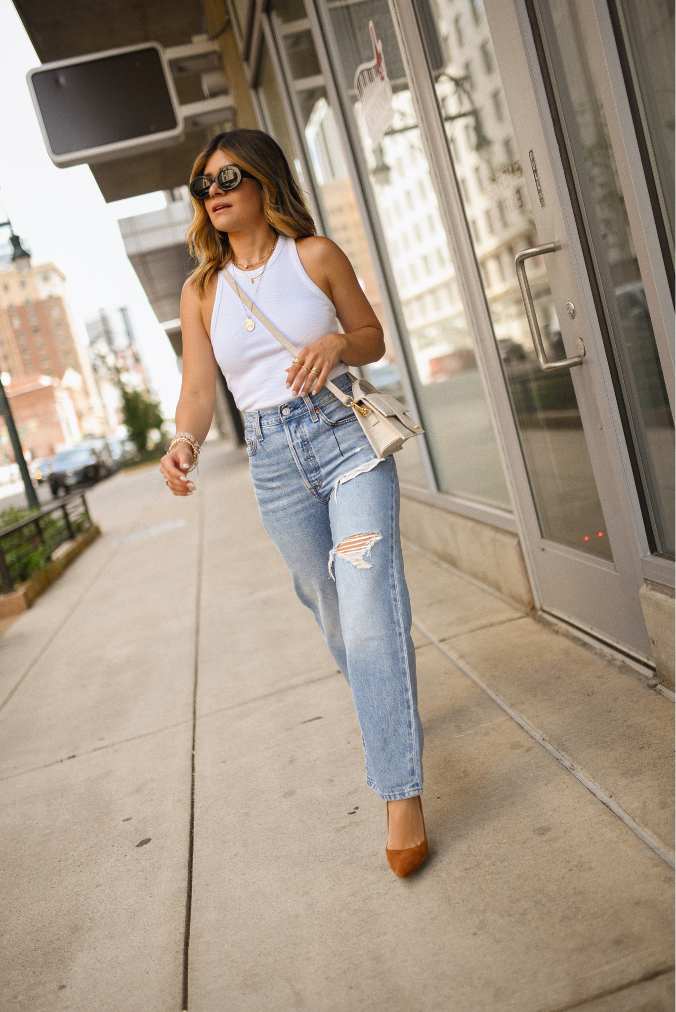 NSALE picks✨✨✨ This Levi’s jeans are so good. They fit true to size! I’m wearing size 24. 
They are 30% off right now!
Denim outfit, jeans, jeans outfit, white tank top, easy denim look, easy denim outfit. 

#LTKSeasonal #LTKsalealert #LTKxNSale