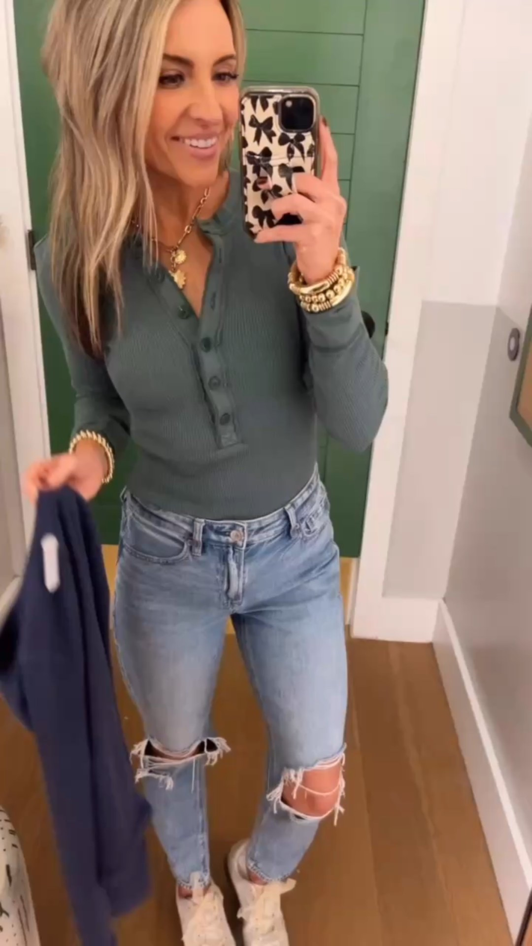 Love the deep plunge of this button Henley Tee! Adorable casual outfit! Grabbed the green for a festive holiday color 🌲 wearing xs. Grab your true size! 


#LTKStyleTip #LTKFindsUnder50 #LTKSaleAlert