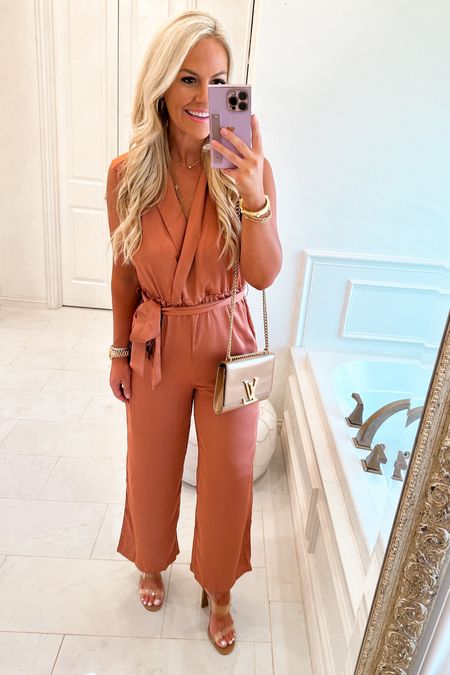 Love this gorgeous copper color fall jumpsuit! It is so chic with this satin fit and  collar detail! Runs tts size I am wearing a size medium and has pockets! 

#LTKwedding #LTKunder100 #LTKmidsize