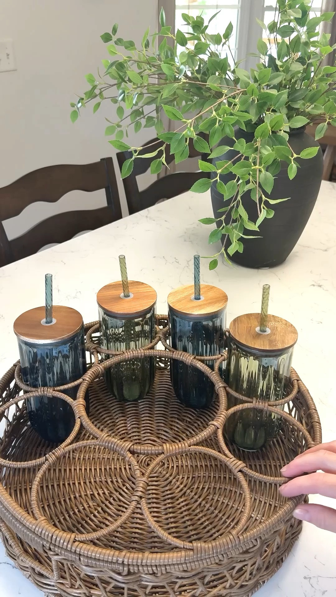 Drink serving caddy
Made of resin rattan- perfect for indoor and outdoor use 

You can take the top- beverage separator off and use the bottom as a tray/basket al

•Handy circle-shaped beverage caddy with 9 compartments
•Divided compartments to keep your drinkware secure while carrying
•Ideal for use in the kitchen, on the porch, or by the pool
•Handwoven twisted resin rattan over a durable metal frame
•Brown finish adds natural beauty to your table
•Can be used to carry more beverages and glasses
•Casual style is ideal for entertaining and family get-togethers

#LTKHome #LTKSeasonal #LTKFindsUnder50