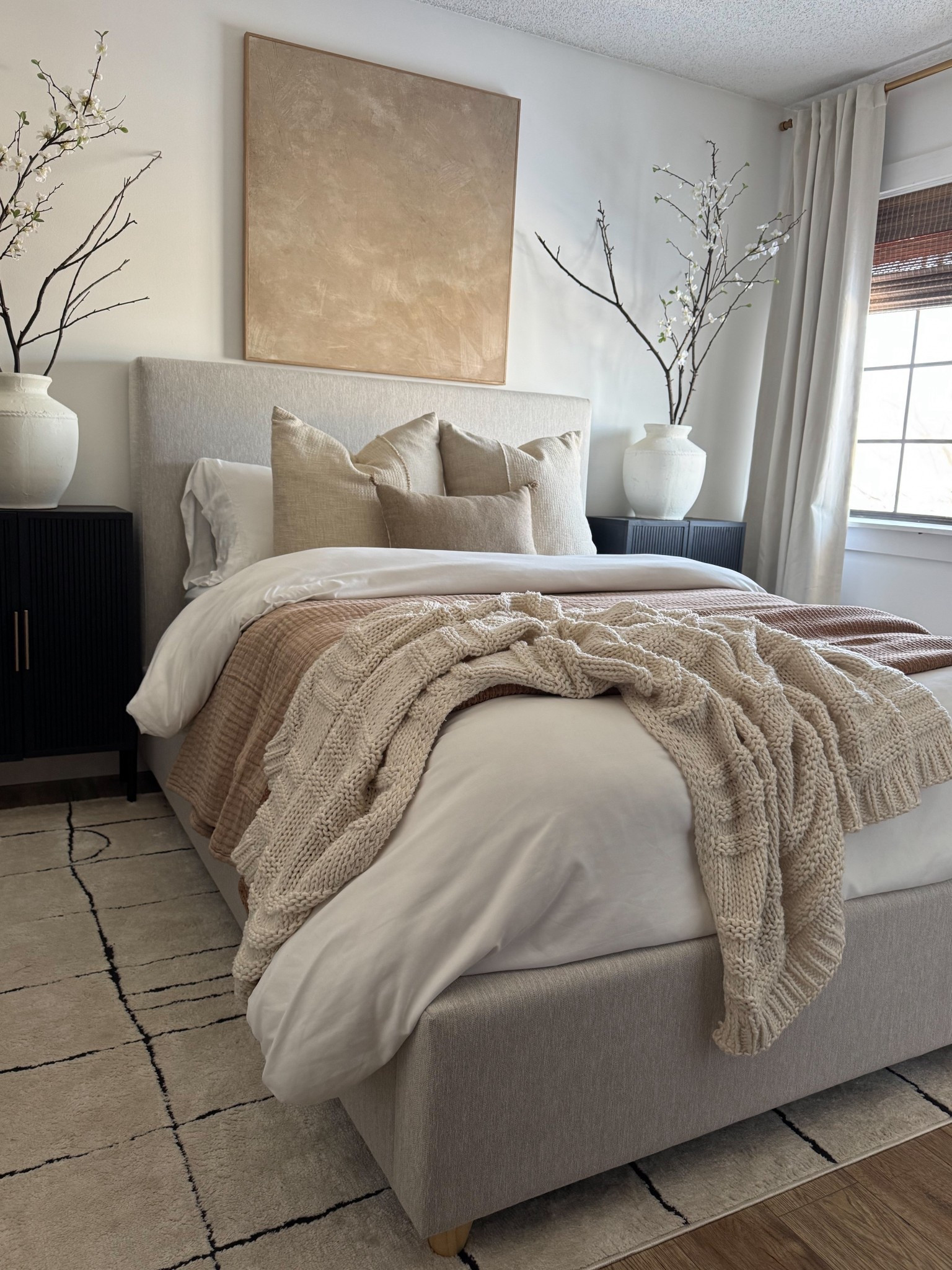 Spring guest bedroom refresh 

Art is from hobby lobby 2441152
Cabinets were a diy 
Vases homegoods 

#LTKSeasonal #LTKHome 