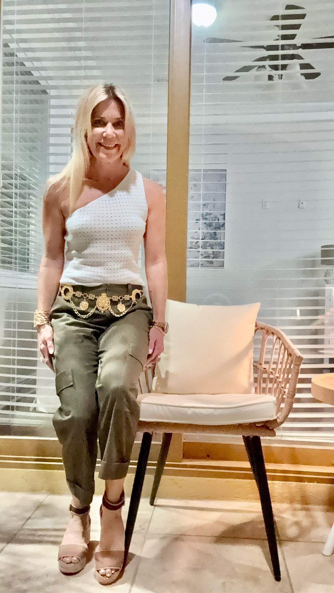 Love the elevated casual of this fun kit one shoulder white top paired with olive cargo pants and a vintage hold lion head belt. Easy to wear transition to fall outfit. Pants are old BCBG, belt is vintage, top is Victor Gleumad.

#LTKShoeCrush #LTKPetite #LTKOver40