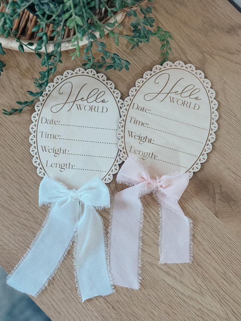 New baby announcement keepsake 🤍 These wood “Hello World” birth stat signs are the sweetest way to introduce your little one + capture all the details—date, time, weight, and length. Neutral, timeless design with soft chiffon bows makes them perfect for hospital photos, newborn pictures, and nursery decor.

Laser cut from real wood with delicate scalloped edges—each piece is unique and made to be a forever keepsake. Available in multiple bow color options to match your aesthetic.

Shop this baby announcement sign + newborn photo prop on my LTK.

#LTKBaby #LTKFinds #BabyAnnouncement #NewbornPhotoProps #HelloWorldSign #BirthStatsSign #NewbornPhotos #BabyKeepsake #NurseryDecor #NeutralBaby #BabyGirl #BabyBoy #PregnancyAnnouncement #HospitalBagEssentials #FirstPhoto #CustomBabyGift #BabyShowerGift #EtsyFinds

#LTKBaby #LTKmomlife #LTKBump