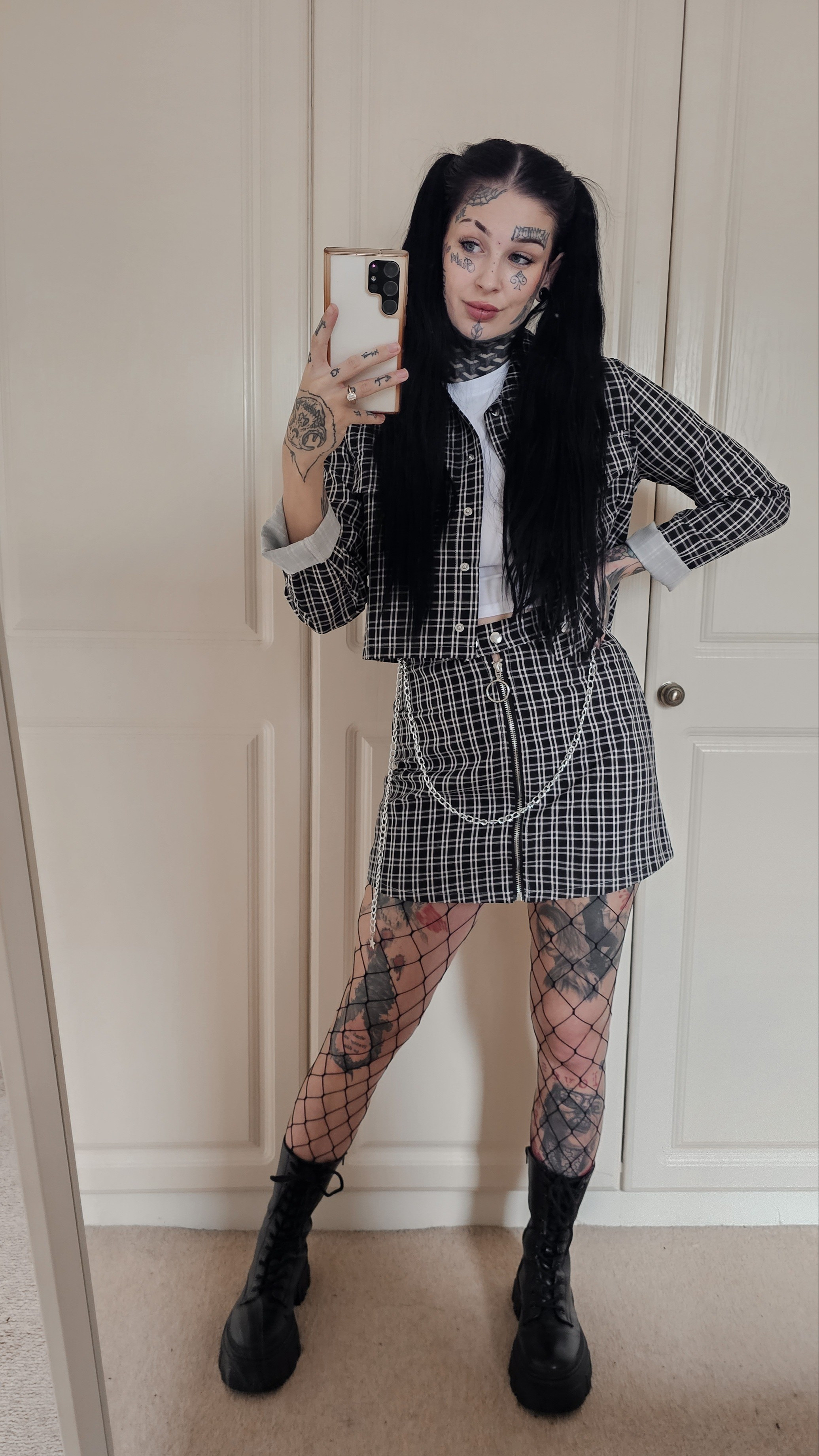 Casual alternative / punk outfit Plaid checkered tartan coord two peice outfit chain detail fishnets monochrome 

#LTKfindsunder50 #LTKU #LTKworkwear