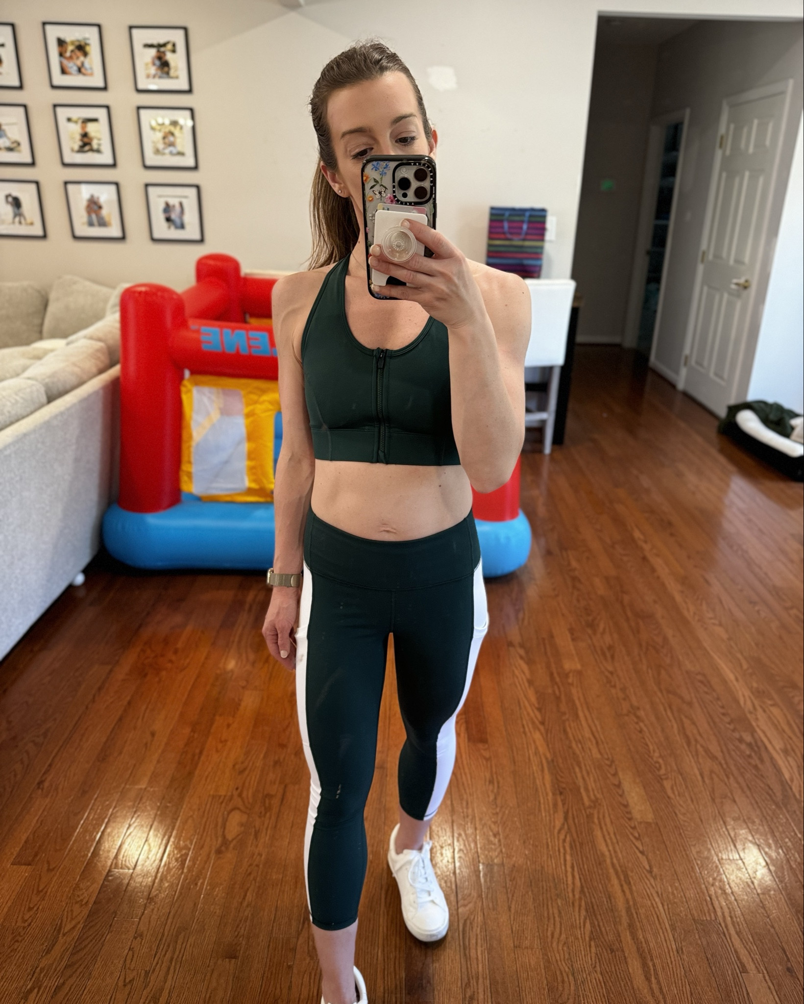 Loving this green two piece workout set from Fabletics! The zip up sports bra is clutch too for extra support. Wore it with my j crew popover and vineyard vines hat! Shoes are Target! 

#LTKfitness #LTKfindsunder100 #LTKActive