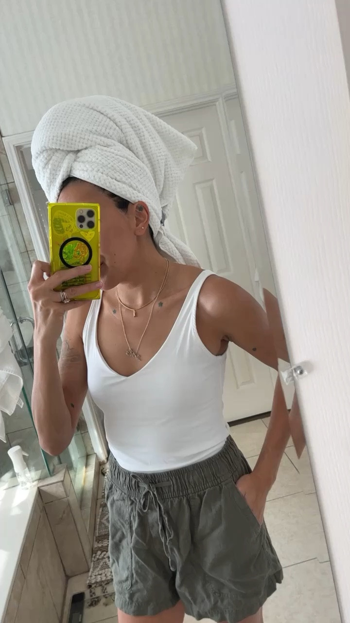 I got a few (and hated) of these type of tanks because the whitematerial was too see-through!  Like, you could see every seam of the built in bra, the removable cups, my tattoos, everything! This tank with shelf bra is definitely not see thru and the set also comes with a black tank too! 

#LTKSeasonal #LTKxPrimeDay #LTKunder50