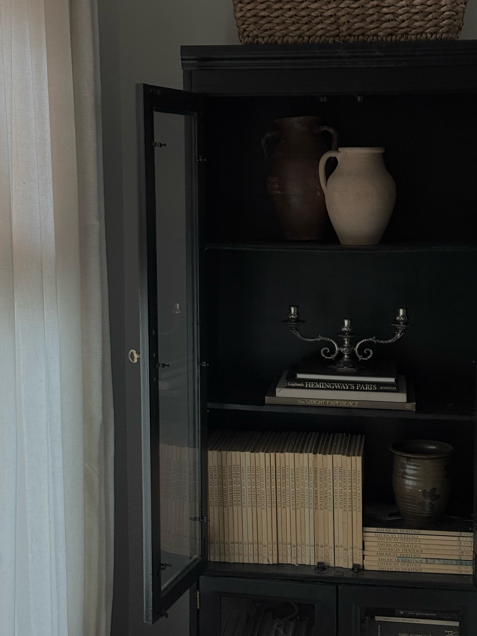 Black glass cabinet 

#LTKHome