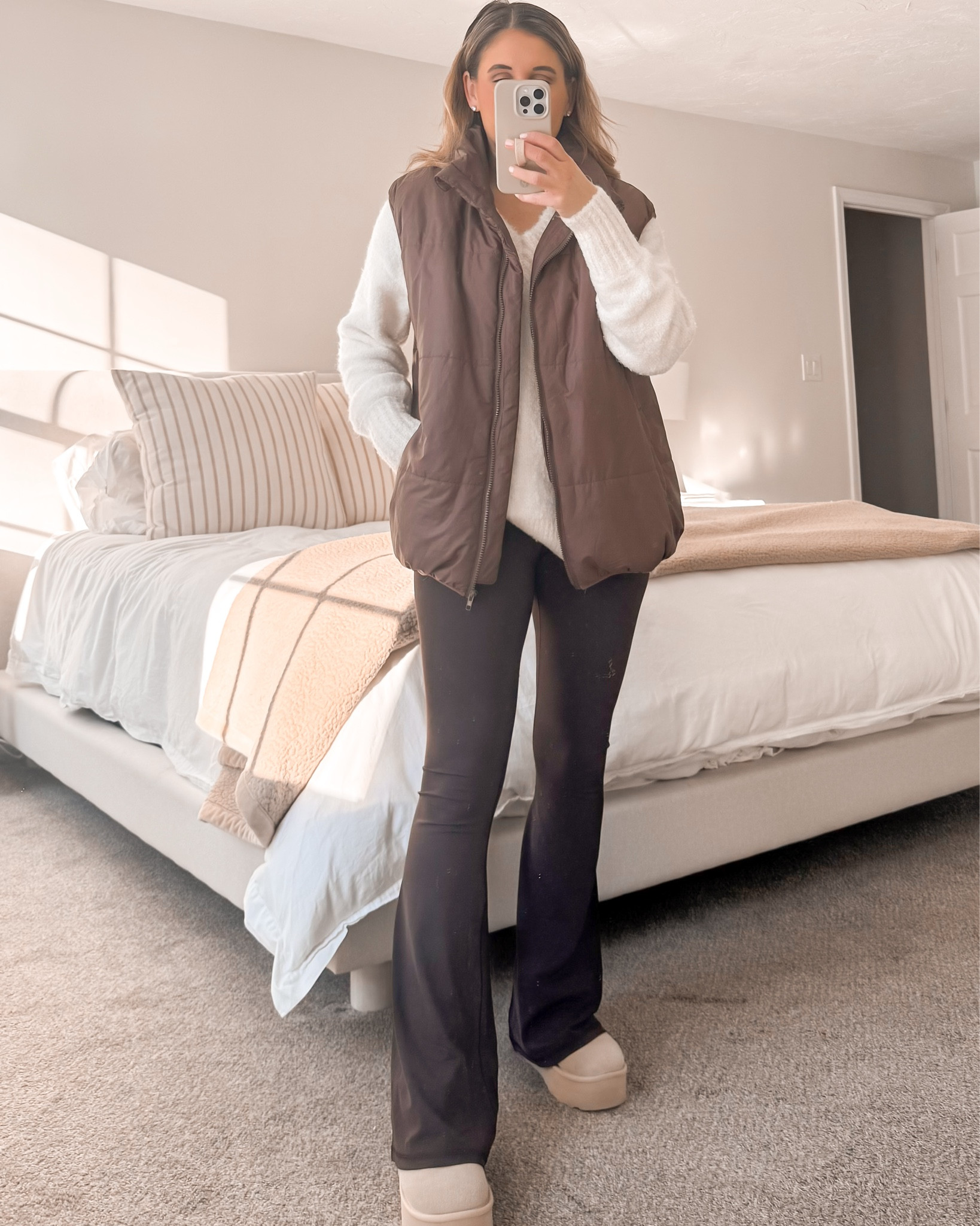 Mom outfit, brown flare leggings, brown vest, white sweater, cozy sweater, Ugg dupes, errands outfit, winter outfit, comfortable outfit 

Sweater runs big, size down. 

#momoutfit #errandsoutfit #brownflareleggings #brownvest #whitesweater #uggdupes #winteroutift 

#LTKFamily #LTKSeasonal #LTKSaleAlert