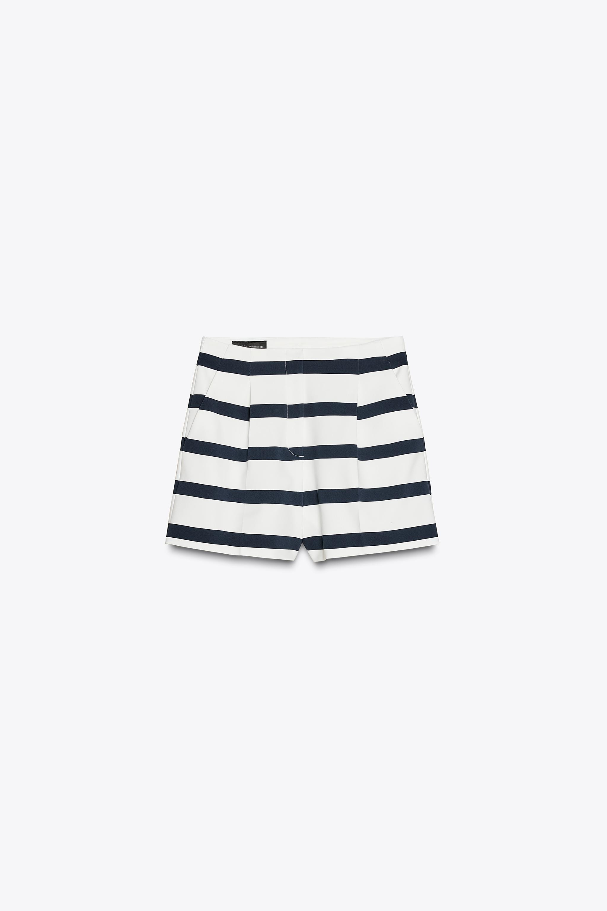 High-waisted shorts with front pleats. Front pockets. Front zip, interior button and hook closure... | Zara US