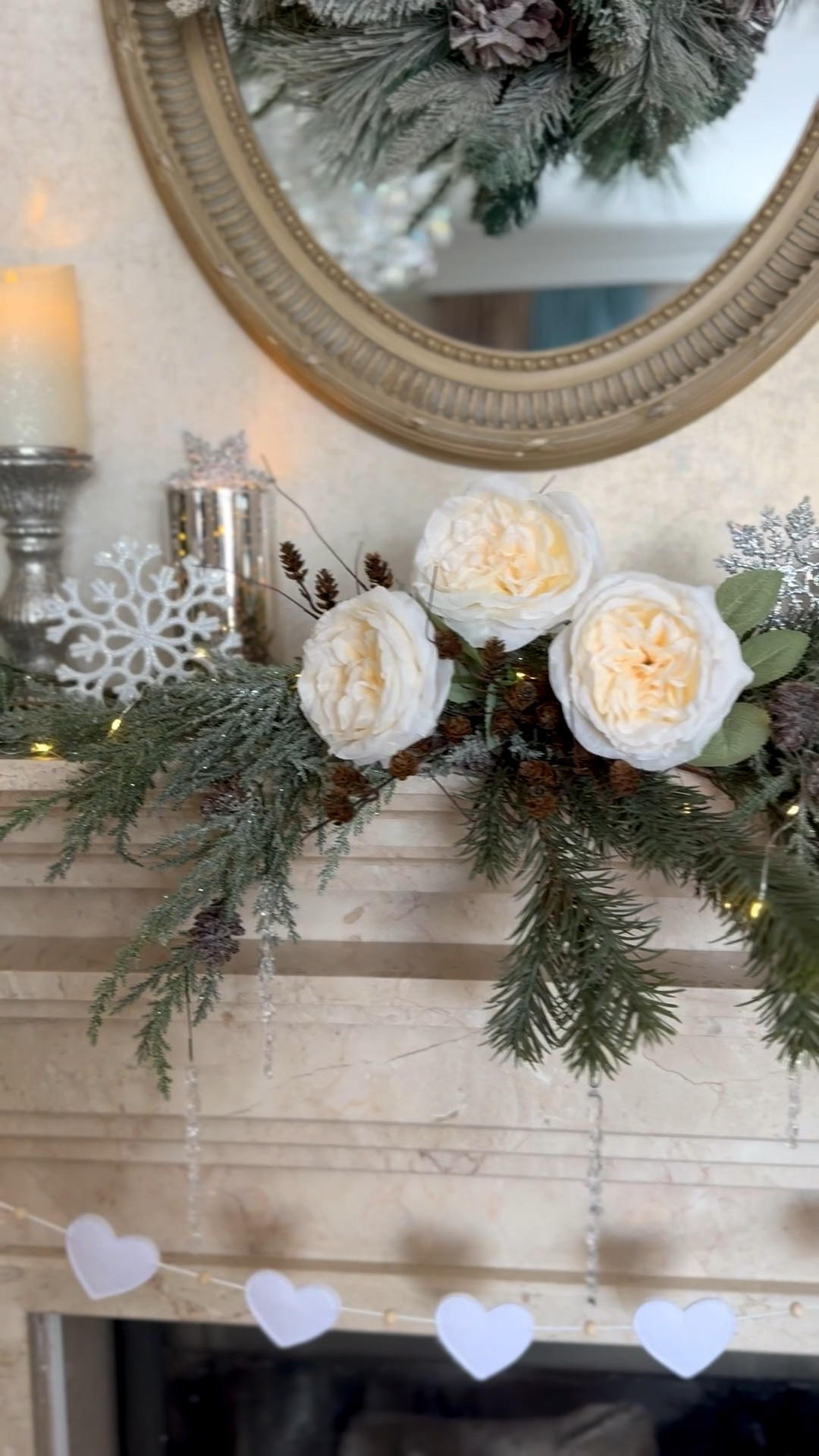 Valentine’s Day living room mantel decor, faux white roses, heart garland, Valentine’s Day decorations 

#LTKHome #LTKSeasonal #LTKFindsUnder50