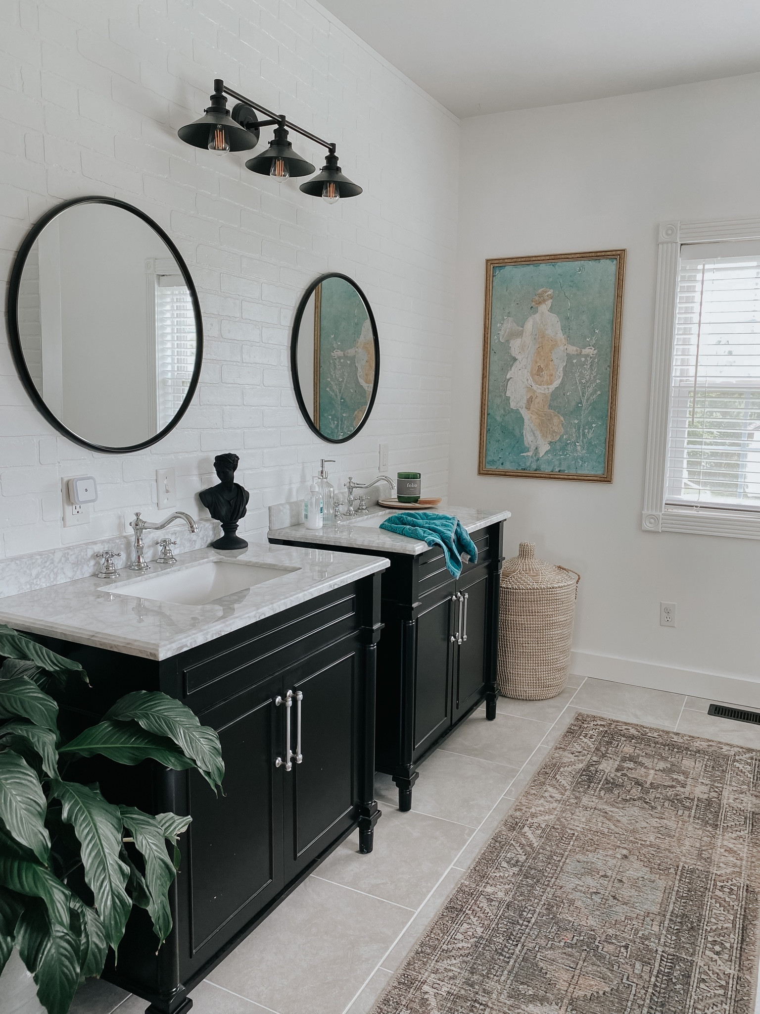 Bathroom details, marble top black vanity, round black mirror, black vanity light, French bathroom faucet chrome, stainless, Amazon, Home Depot, Serena and Lily 

#LTKhome #LTKsalealert #LTKSeasonal