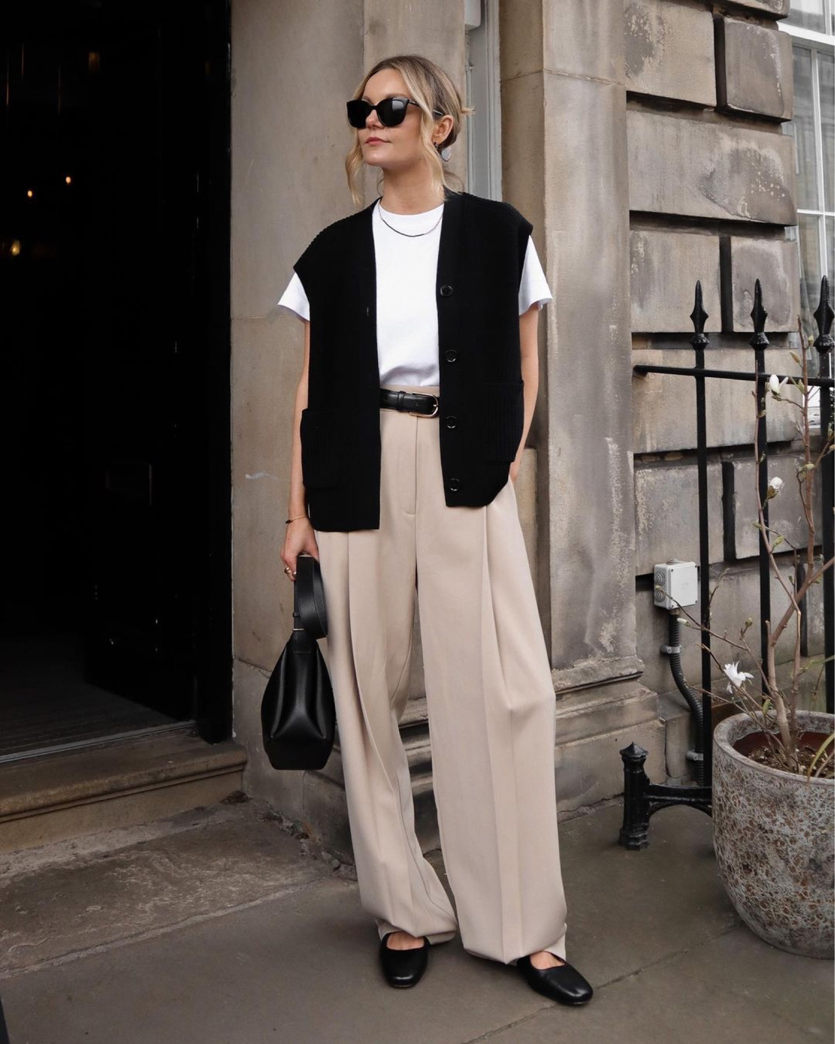Formal wear, office outfit, beige pants, trouser ootd, black sweater vest, white t-shirt, black bag, black sunglasses, formal black shoes, black thin belt, spring outfit

#LTKworkwear #LTKeurope #LTKSeasonal
