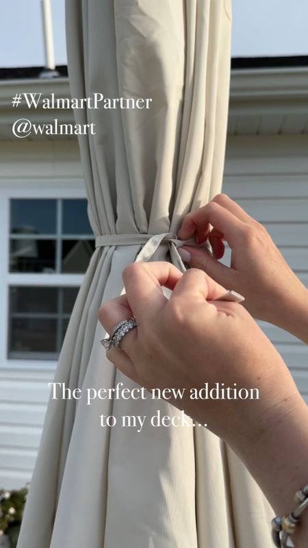 ✨ The perfect addition to my Walmart Patio set… this gorgeous tasseled umbrella! #walmartpartner #walmarthome @Walmart 

I saw this umbrella when I was browsing the app the other day and immediately knew it would be perfect for my space that gets sun all day long - I love to sit in the shade and this umbrella is going to be perfect for spending even more time outside this summer! 

Included in my current patio lineup is the Brookbury Patio Set that includes the L couch, coffee table, and two side stools that tuck under the table, as well as this gorgeous border rug, an ember urn planter, a faux triple topiary, all from Walmart!  I’ve linked a few of my other favorite patio sets and patio accessories from Walmart in my LTK - make sure you look and see what other great finds Walmart has (P.S. - so many pieces are on deal for MDW!)