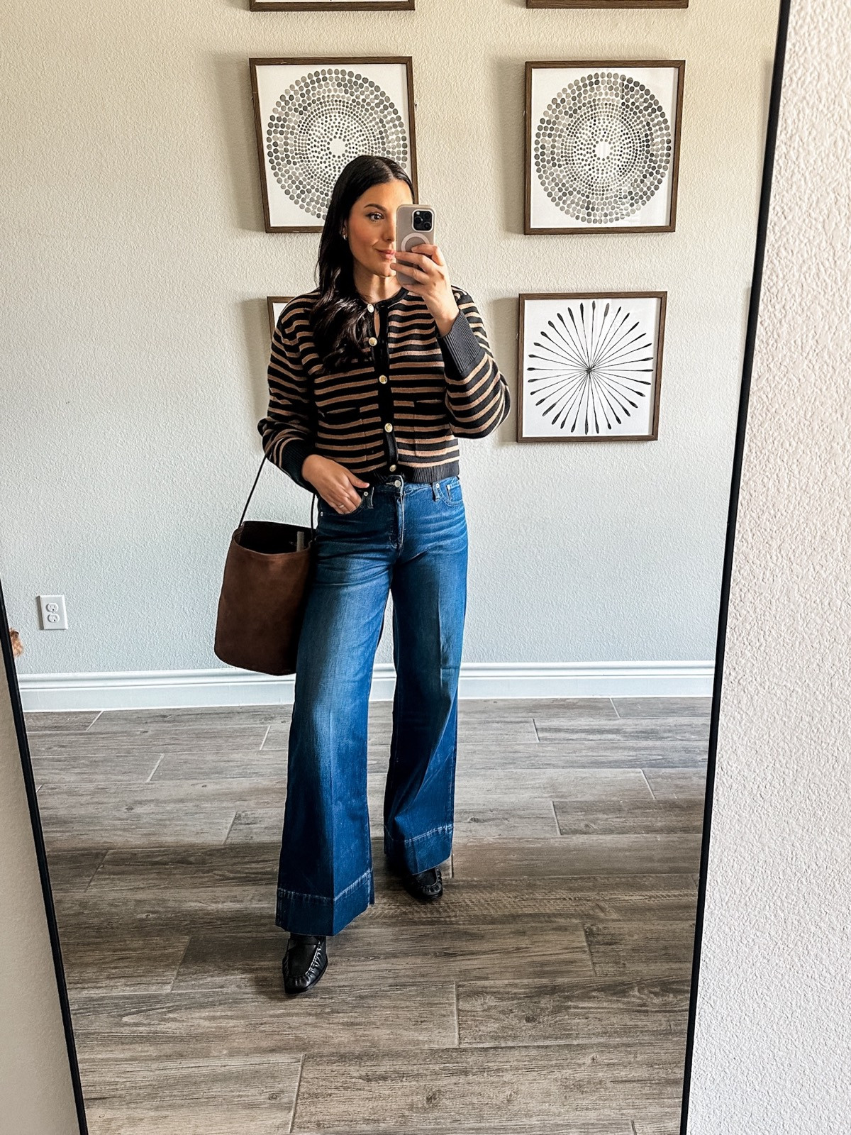I love this pair of denim trousers, in fact they may be my favorite from J.Crew yet. I am usually a huge high waisted denim fan and while these claim to be
"low rise"
", I think
they're more mid rise and I love this option.
/ A wide leg denim trouser is already a lot of denim, so having a lower rise
gives a nice proportion to the outfit instead of having a full denim leg up past your belly button. I am in the 30, they fit well. I would say if in between sizes, go down a size as they seem like they will stretch with wear. I am in the regular length, plenty long
for me!