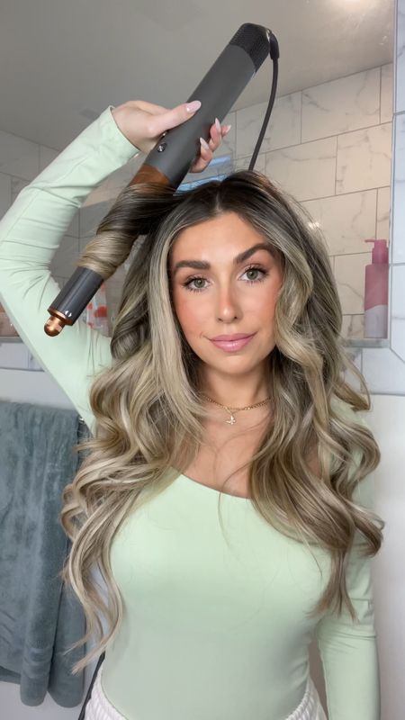 Bouncy Dyson Airwrap Curls 🫶🏼💐✨ this is one of my favorite ways to use the tool!! The curls when holding the barrel down and using it similarly to a wand are just STUNNING and so voluminous 

#LTKfindsunder100 #LTKbeauty #LTKVideo