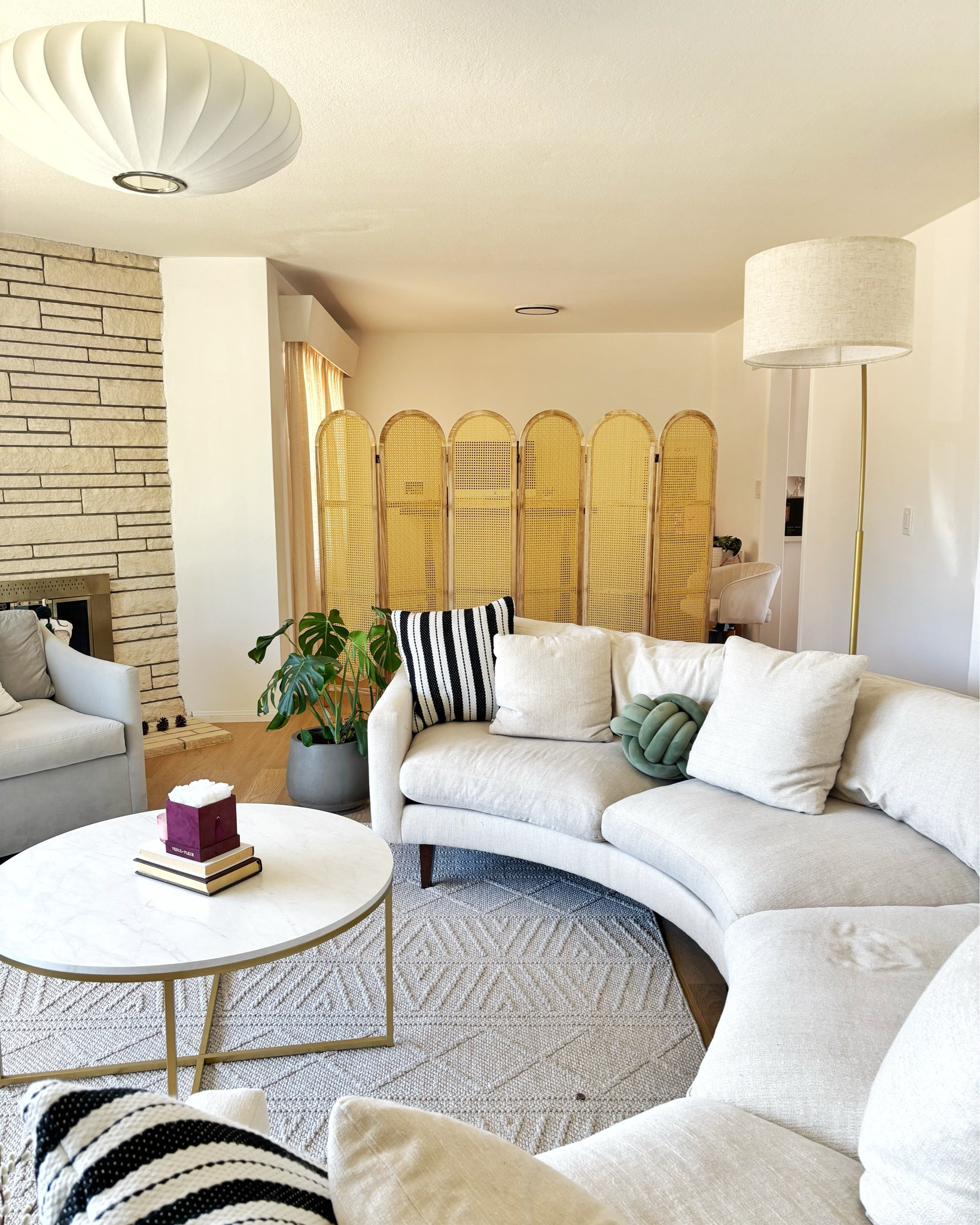 Leesa needed a solution to hide her office at the end of her living room.  We talked through multiple options- maybe add a wall, or move the office into the guest bedroom instead?  In the end she decided a screen was a simple, low cost solution to not have to look at it and not embark on a big project. This screen looks great and isn’t too expensive.  

#LTKHome