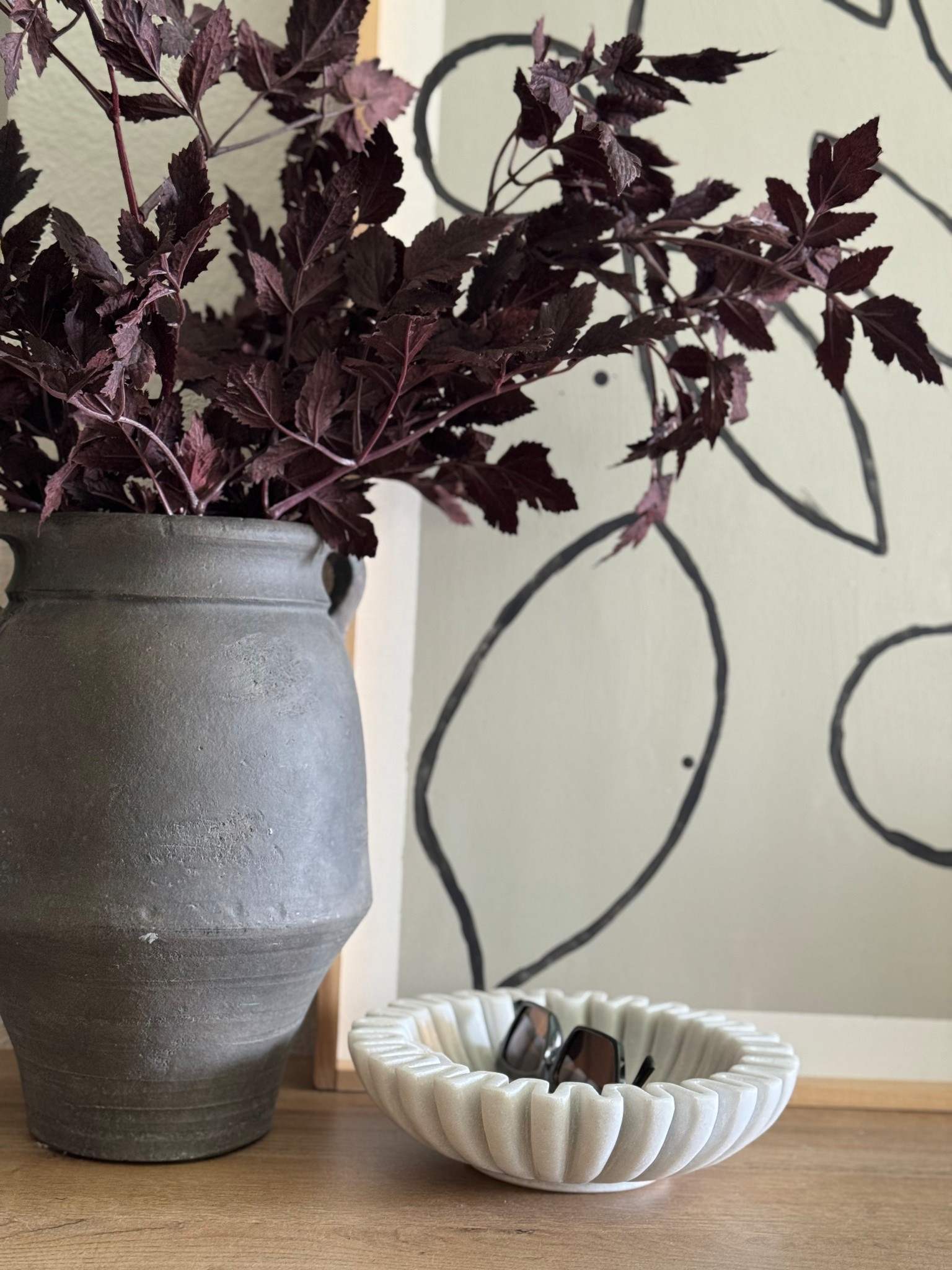 Easy minimal Fall home console styling with a fluted marble bowl for a pretty junk bowl and the prettiest burgundy fall stems

#LTKHome #LTKSeasonal #LTKStyleTip