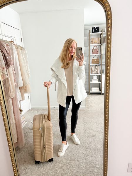Ready for holiday traveling in this neutral and casual outfit! This zella wrap is now on sale for 60% off. 

#LTKHoliday #LTKtravel #LTKunder100