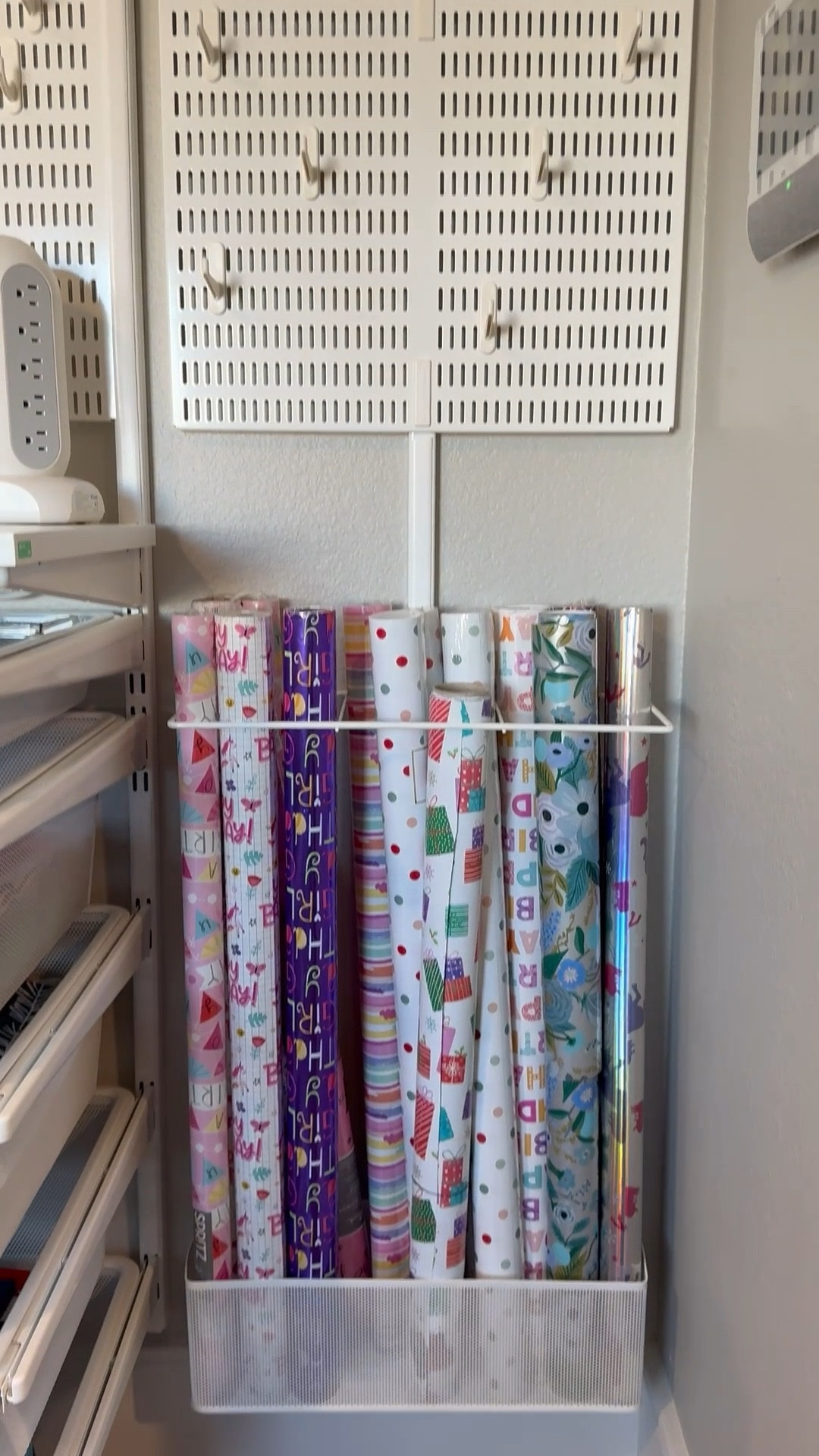 Another great solution for wrapping paper! Keep it contained and keep it at the ready! 

#LTKHome #LTKSeasonal