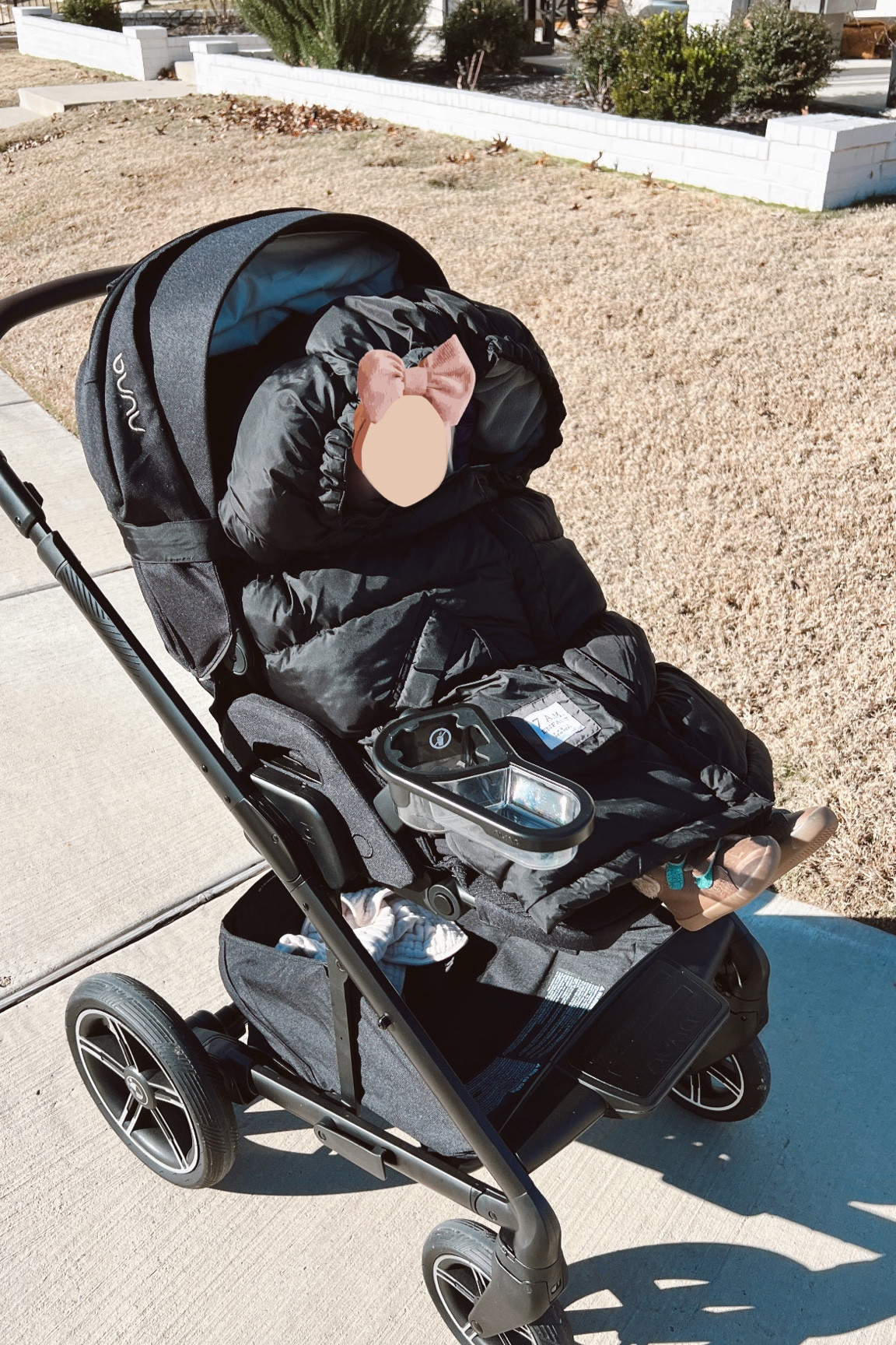 Winter walk with the best stroller, enfant wrap, and bear hat and mitten set to keep her warm. 

#LTKKids #LTKBaby #LTKStyleTip