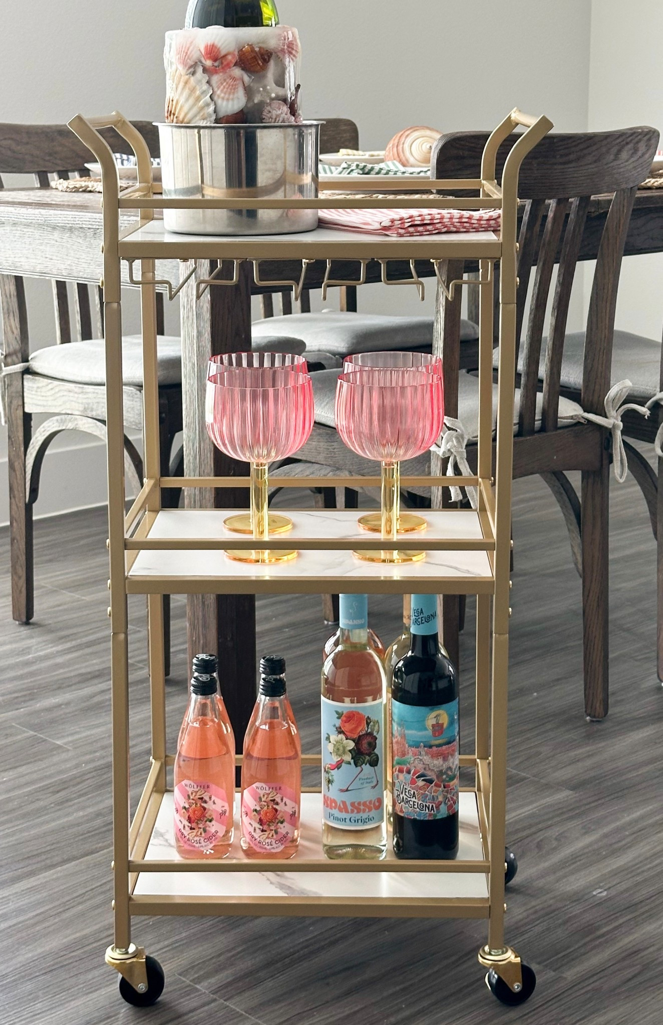 Shop my bar cart!!! I love it and it’s the perfect size!!! Also… the wine glasses (not glass) are soooo fun for Summer and come in other colors! 🐚🌴🍾

#LTKHome #LTKSummerEdit