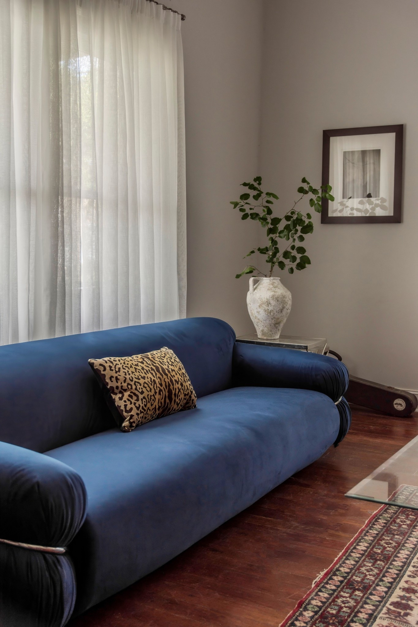 The Frattini Sesann Sofa by @manhattan.home.design (#ad) is a reproduction of an iconic 1970 low-slung sofa by Giancarlo Frattini, featuring chrome-cinched sides with gathered pleating. I loved introducing this sleek silhouette to my 1920s bungalow project in Southwest Atlanta to create my favorite blend of old-and-new. I love how it pairs with the vintage acrylic-and-chrome coffee table I previously sourced, and the Italian-style glass in the new chandelier. ⁠

#LTKHome