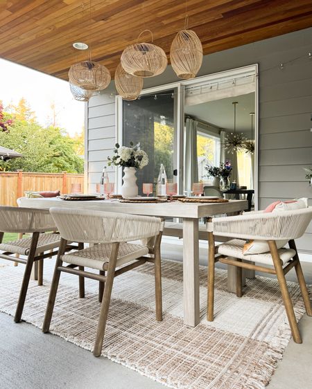 Outdoor dining table and dinnerware, outdoor chairs and rug, acrylic ribbed cups, lanterns, hanging planters 

#LTKparties #LTKSeasonal #LTKhome