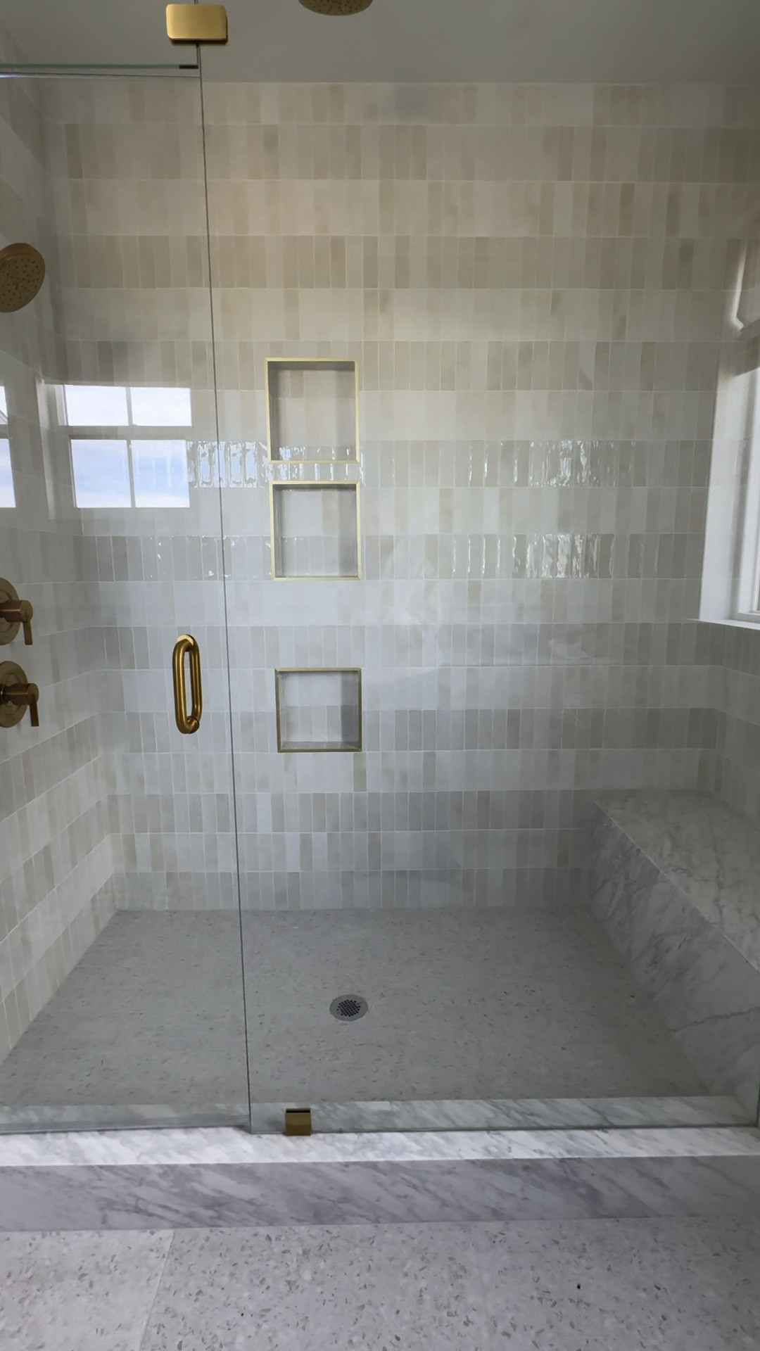 Bathroom 
Tile 
Shower 
Organic 
Neutral 
Modern 

#LTKstyletip #LTKover40 #LTKhome