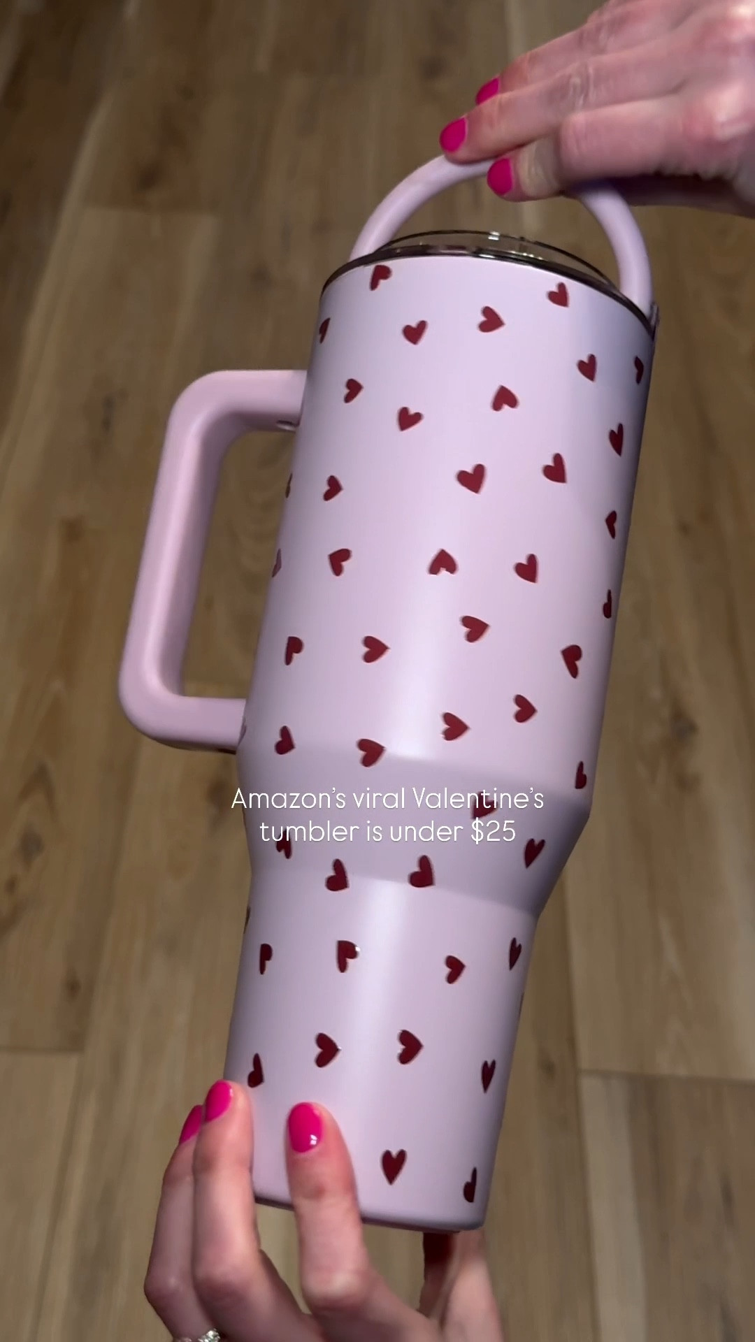 the viral Valentine's tumbler from Amazon 🤍

What you get:
• 40oz capacity (fits in cup holders)
• Comes with straw lid + straw cleaner
• Handle for easy carrying
• Pink with red hearts
• Under $25

Save this before it's gone.

#LTKValentine #LTKmomlife #LTKHome