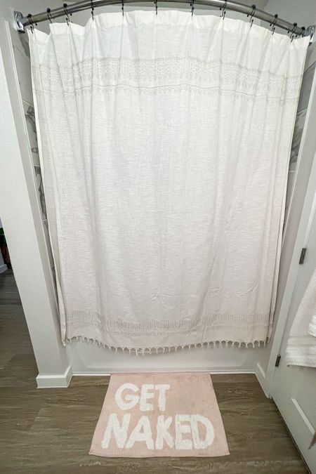 Bathroom shower curtain and bath mat 🛁 Shower curtain is Hearth and Hand Magnolia brand from Target - Pink get naked bath mat is from Urban Outfitters and it is on sale right now! 🤩 

bathroom decor, apartment bathroom, college bathroom decor 

#LTKsalealert #LTKfamily #LTKhome