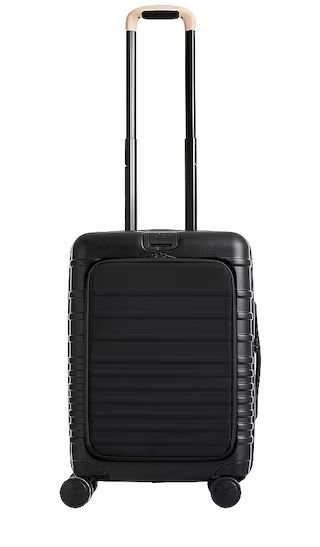 The Front-Pocket Carry-On Roller in Black | Revolve Clothing (Global)