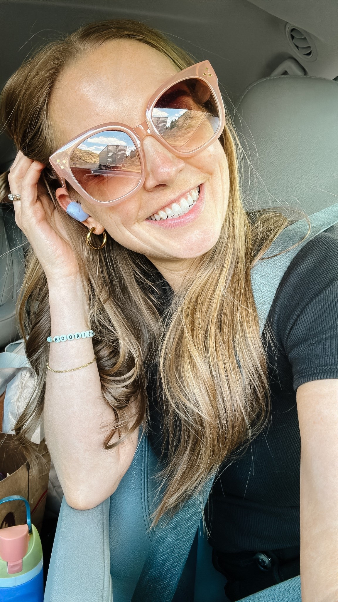 I posted a picture of these sunglasses yesterday and my weekly question box blew up with people asking for the link.

Good news - they're only $7 and they hit that sweet spot between comfortable and not too loose where they fall off your face (I HATE that!). 

I bought these last summer and loved them so much I bought the black pair too! 