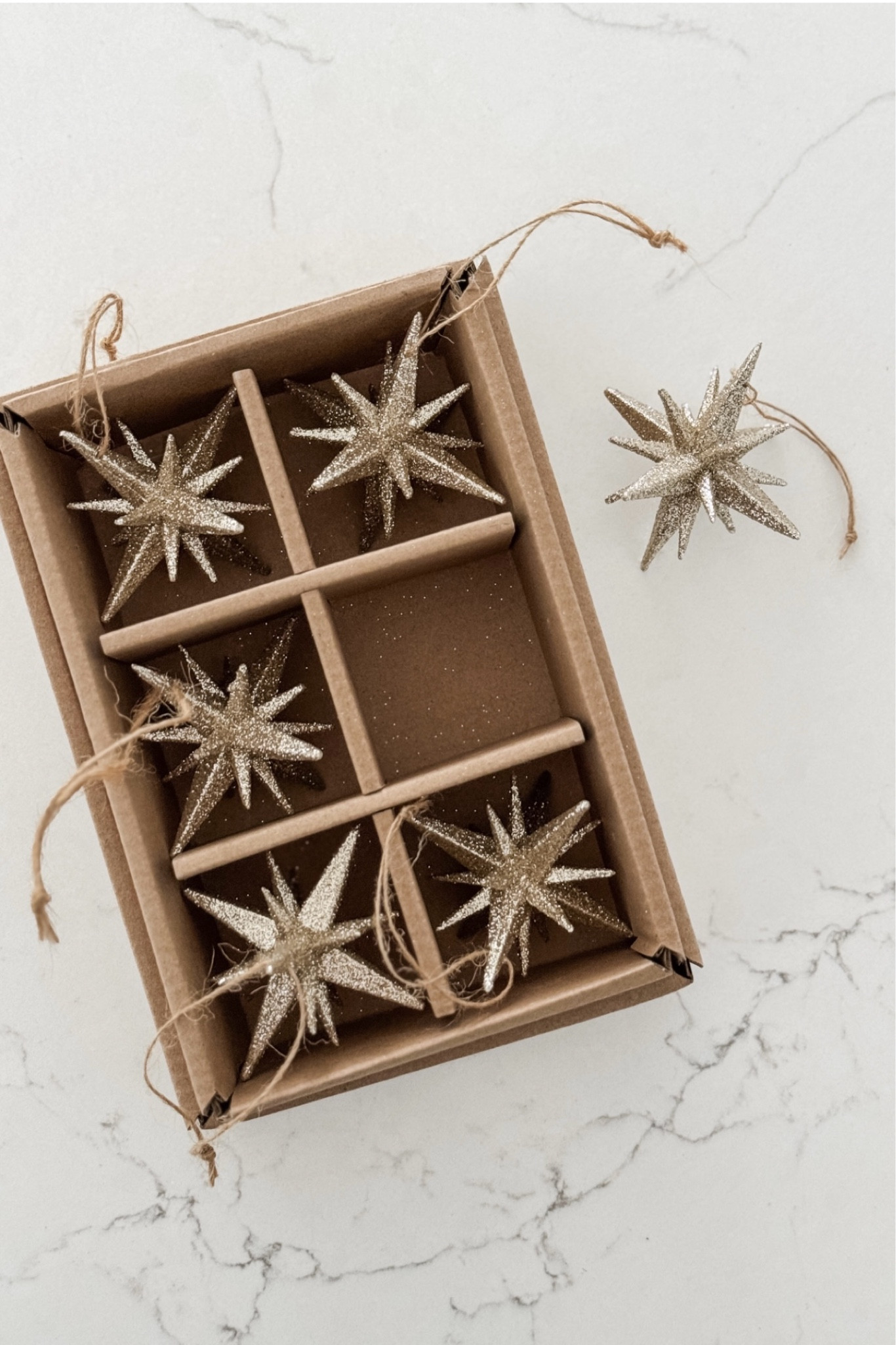 I’m crazy about these little golden glitter “starburst” ornaments on our tree! I have both sizes and I think the way the lights sparkle off of them really makes our tree feel magical. ✨💫

#LTKHoliday #LTKHome