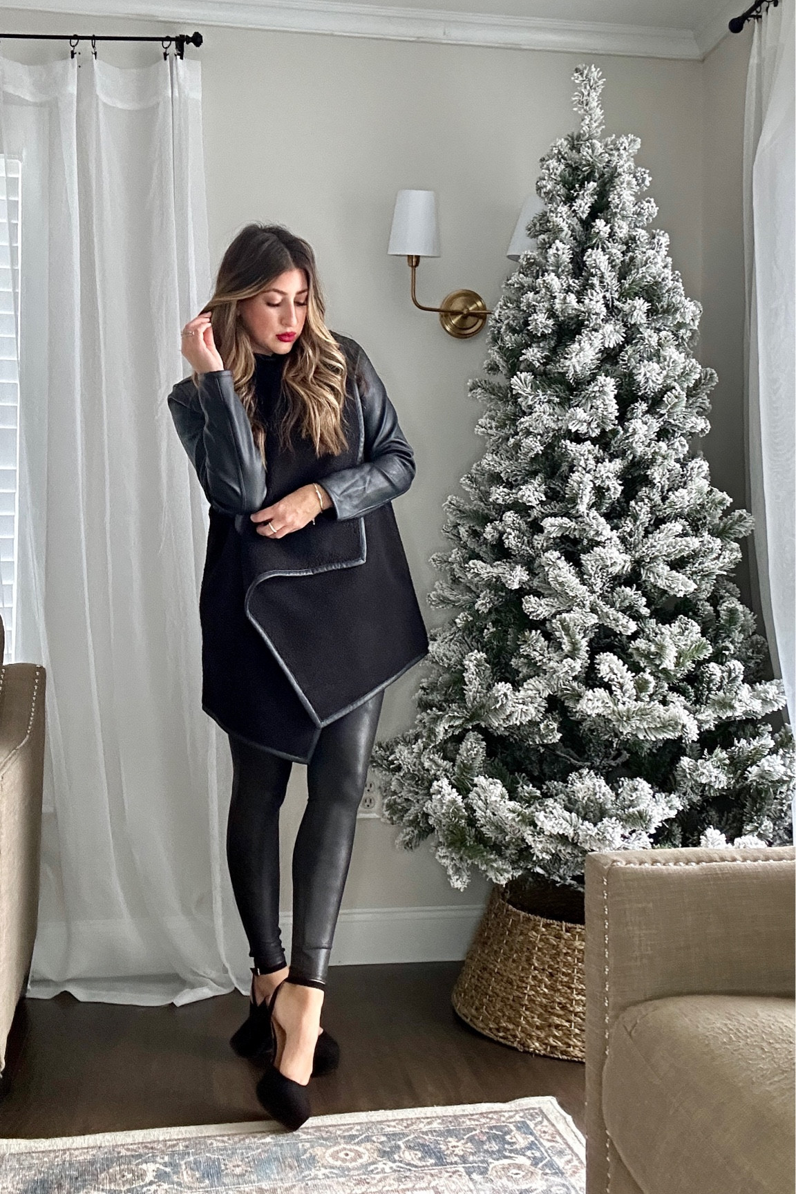 Another perfect holiday outfit: an all black look with faux leather leggings, leather-like mock neck bodysuit and this fleece/leather long wrap jacket. 🖤 

Use code LAURENHXSPANX for 10% OFF!

Wearing meds in bodysuit + leggings and small in jacket. Loving this look! Tap photos to shop now on SALE! (Limited time) and follow for more! Xx#LTKCyberWeek

#LTKHoliday #LTKstyletip
